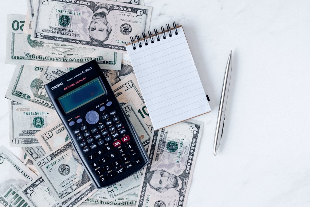 Calculator and budget notes for a non profit organization