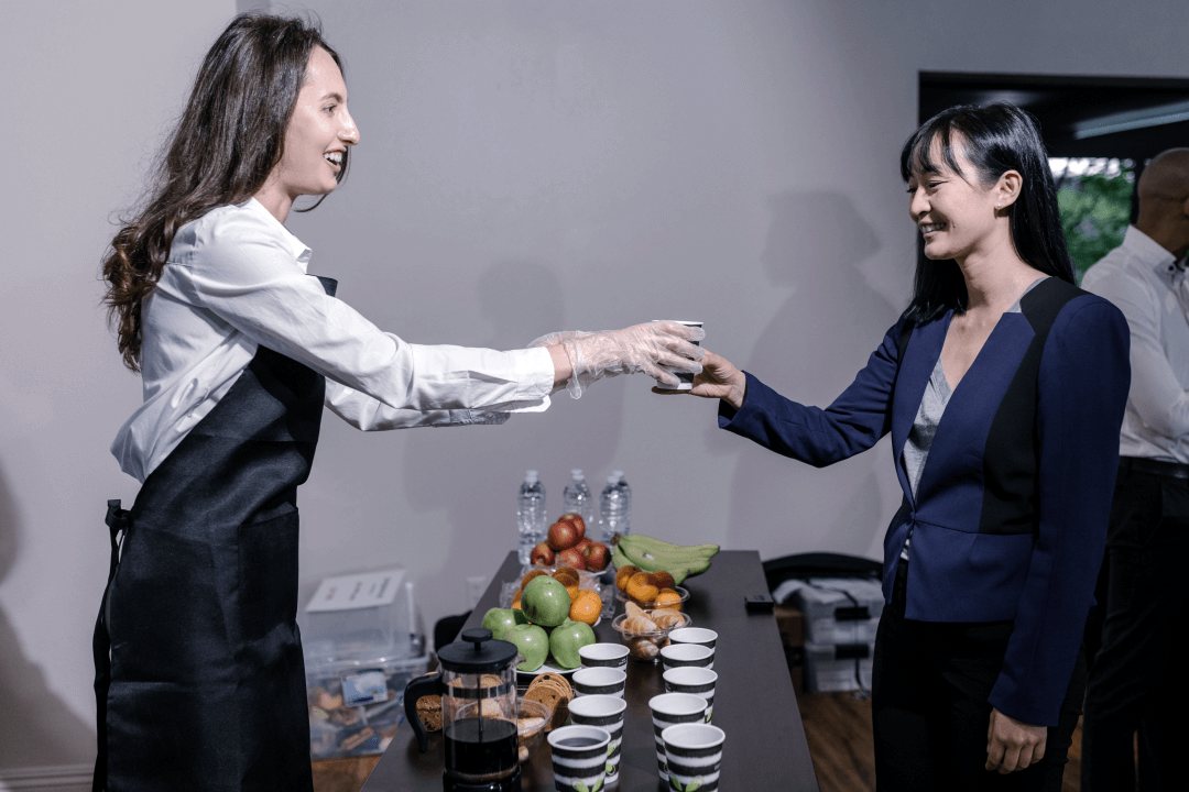 Hospitality staff welcoming a guest
